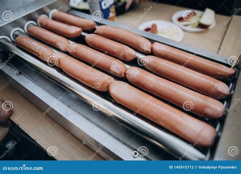 Sausages for Hot Dog on the Grill Stock Photo - Image of dark, brown: 145915712