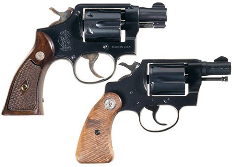 Two Snub Nose Double Action Revolvers -A) Smith & Wesson .38 M&P Revolver