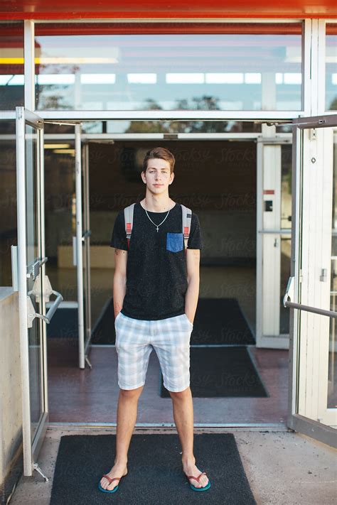 "Smiling Portrait Of Teeange Person Standing Outside School Building ...