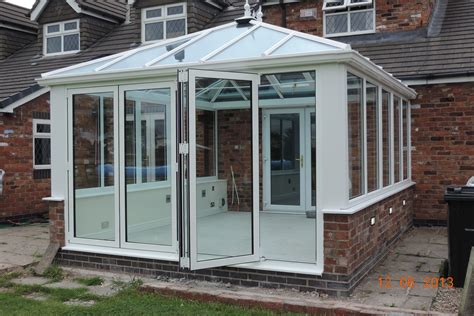 Pin by Latchford Village Windows on Conservatories | Bifold doors ...