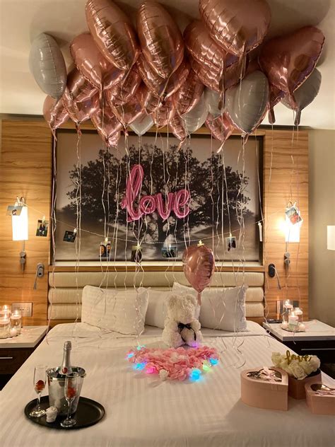 Romantic Hotel Room with Pink and Silver Balloons