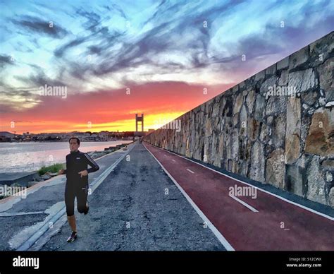 Running at sunset Stock Photo - Alamy