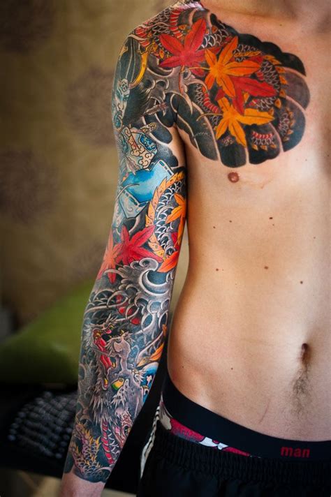 Bright Chest & Sleeve Tattoo | Best tattoo design ideas