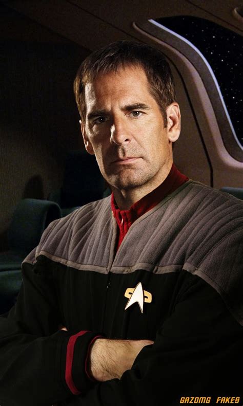 a man in a star trek uniform is looking at the camera with his arms crossed