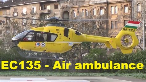 EC135 Air ambulance helicopter landing and takeoff at hospital heliport ...