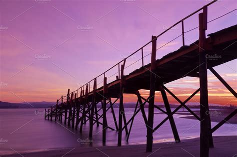 Wooden pier featuring pier, wooden, and sea | High-Quality Nature Stock Photos ~ Creative Market