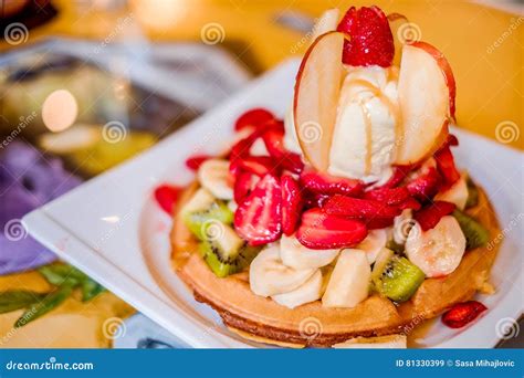 Waffle with Ice Cream and Fruits on a Plate Stock Image - Image of cake, flavor: 81330399