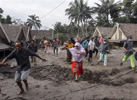 Semeru volcano eruption kills at least 14 Indonesians, with 1,300 ...