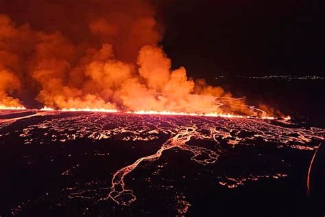 Watch: Fast-travelling molten lava flows metres from Iceland defence ...