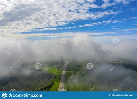 Road with Cars, Low Clouds, Shoot from a Drone. Beautiful Landscape from Above Stock Photo ...