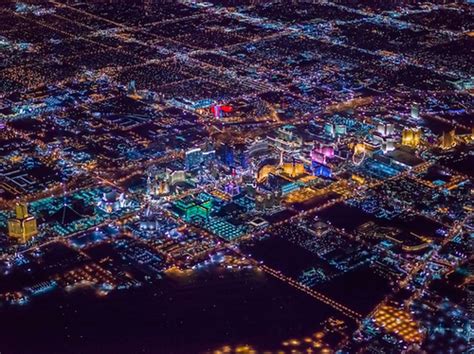 Aerial Photos of Las Vegas at Night Surrounded by the Pitch-Black ...