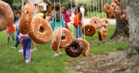 Hang donuts for a donut eating contest! Cute idea! I would like to sign up for said donut eating ...