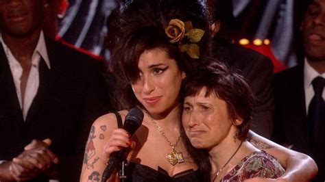 GRAMMY Rewind: Watch A Stunned Amy Winehouse Win Record Of The Year For ...