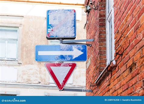 Snowy Road Signs in the City - End of Living Street, One-way-street, Give Way Stock Photo ...