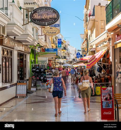 Shops, bars, cafes and restaurants in a pedestrian precinct in La ...