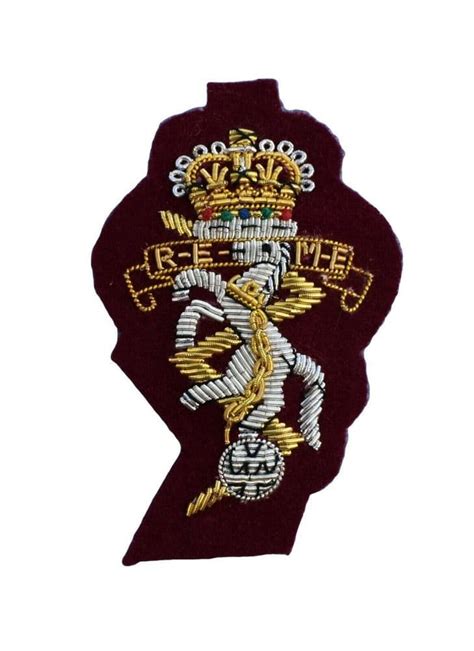 REME Airborne Officers Cap Badge on Maroon