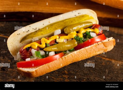 Chicago Style Hot Dog with Mustard, Pickle, Tomato, Relish and Onion Stock Photo - Alamy