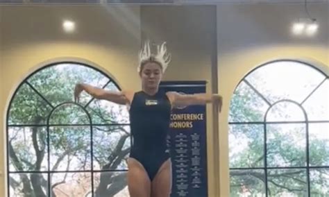 LSU Gymnast Olivia Dunne Show Flexibility and Long Legs on Balance Beam ...