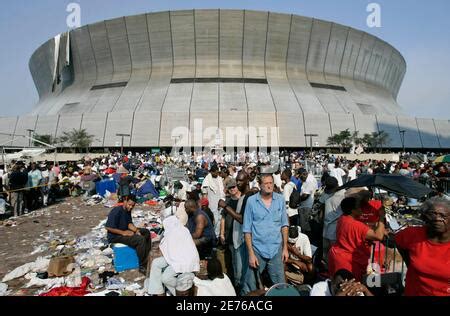 Thousands of Hurricane Katrina survivors from New Orleans were bused to a Red Cross shelter in ...