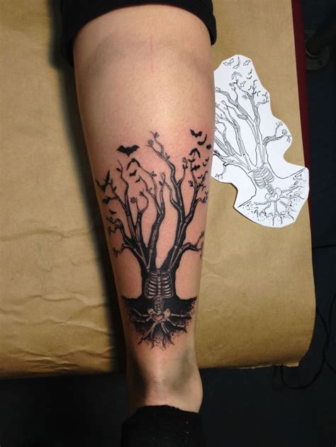 love the skull in the tree trunk! | Geometric tattoo, Skeleton tree, Tattoos