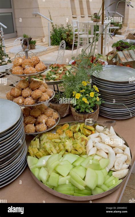 Assortment of salads on display on a buffet table Stock Photo - Alamy