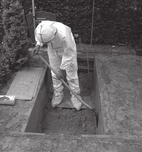 5 Exhumation of a grave in a cemetery by a forensic archaeologist ...