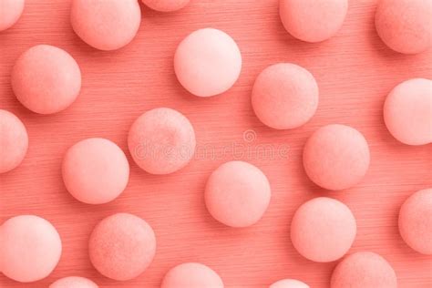 Small Round Candy Living Coral Pastel Background. Stock Photo - Image of multi, hard: 136322494