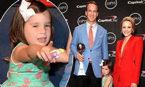 Peyton Manning's daughter Mosley clings to his leg at the 2015 ESPYS ...