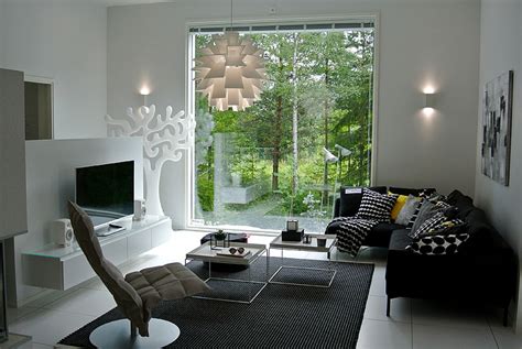 Royalty-Free photo: Black fabric sectional sofa beside the clear glass window | PickPik