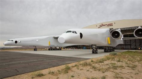 Stratolaunch, the world's largest plane, emerges from its hangar for the first time