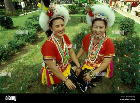 women in taiwanese traditional dress on a event in the city centre of ...