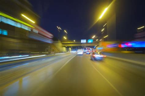 Driving through the City at Night Stock Image - Image of scene, cityscape: 270356805