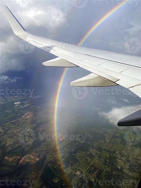 Rainbow view from an airplane 13565955 Stock Photo at Vecteezy