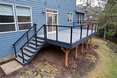 Striking Stainless Steel Cable Deck Railing On New Deck