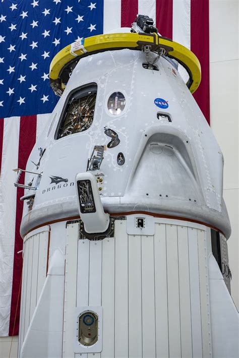 Space UpClose: Dragon Demo-2 Crew Capsule Trunk Attached as NASA Worm Returns on SpaceX Falcon 9