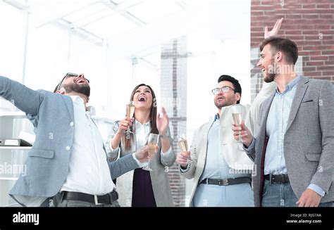 very happy business team in the office Stock Photo - Alamy