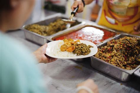 Volunteers serving food for poor people : Food sharing concept - CMBG3 Law