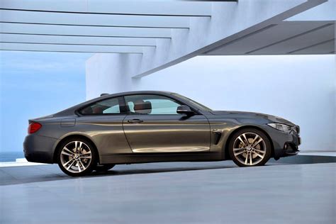 Side angle of the grey 2014 BMW 4 Series Coupe