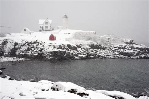 Nubble Lighthouse Winter Snowstorm Stock Photos - Free & Royalty-Free ...