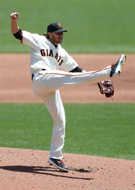 San Francisco Giants pitcher Jake Peavy follows through on his pitch ...