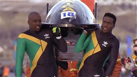 Cool Runnings: The team carrying the bobsled to the finish line after ...