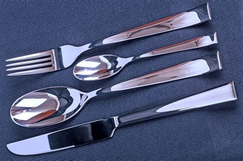 Eating Utensils On A Black Fabric Stock Photo - Download Image Now - iStock