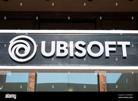 Ubisoft logo and sign above the entrance to Ubisoft Entertainment SA ...