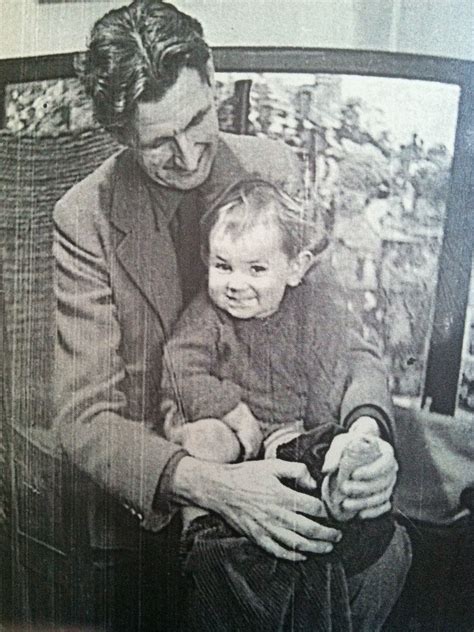 Author George Orwell getting his two-year-old adopted son, Richard Blair, ready for an outing ...