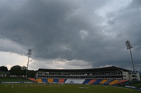 Dark clouds hover around the Pallekele International Cricket Stadium ...