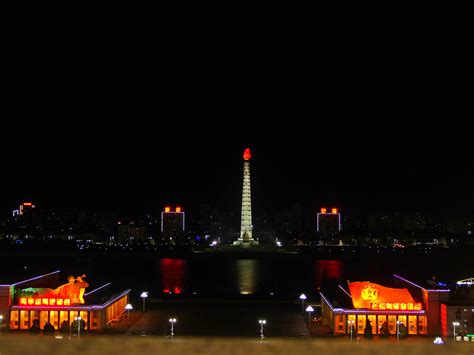 Download Juche Tower Pyongyang At Night Wallpaper | Wallpapers.com