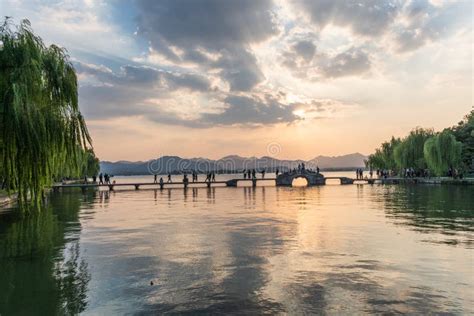 Sunset at the Hangzhou West Lake Stock Photo - Image of asian, clouds ...