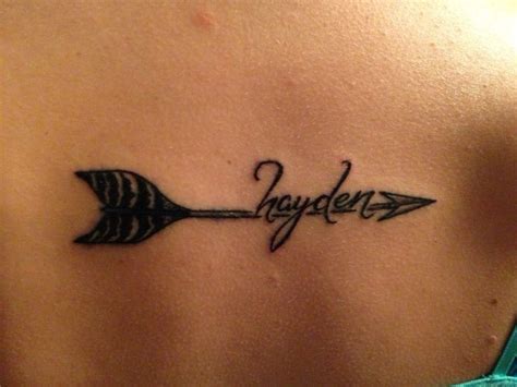 Black indian arrow tattoo with inscription - Tattooimages.biz