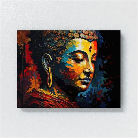 a painting of a buddha head on a wall