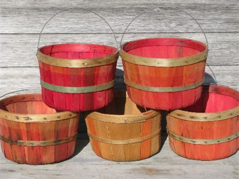 lot old farmer's market wood baskets for orchard or farm garden produce